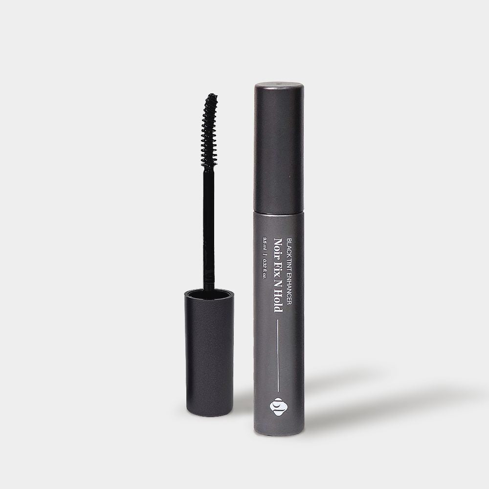Front view of BL Lashes Black Tint Enhancer Noir Fix N Hold tube next to its opened curved wand applicator.