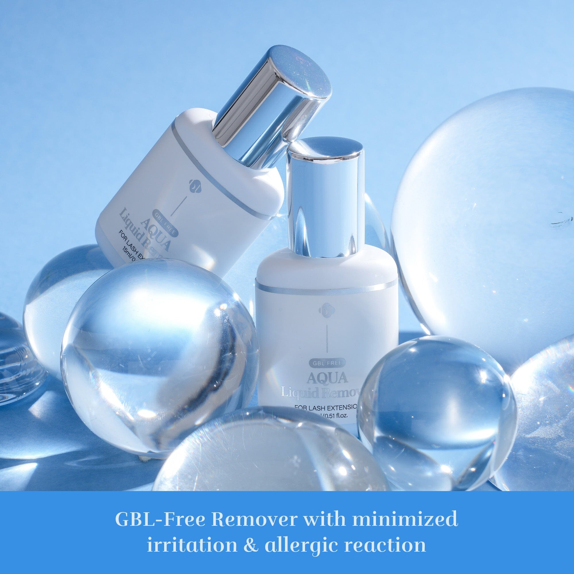 Two BL Lashes Aqua Liquid Remover 15ml bottles displayed among clear glass spheres against a blue background. The bottom text reads: GBL-Free Remover with minimized irritation & allergic reaction.