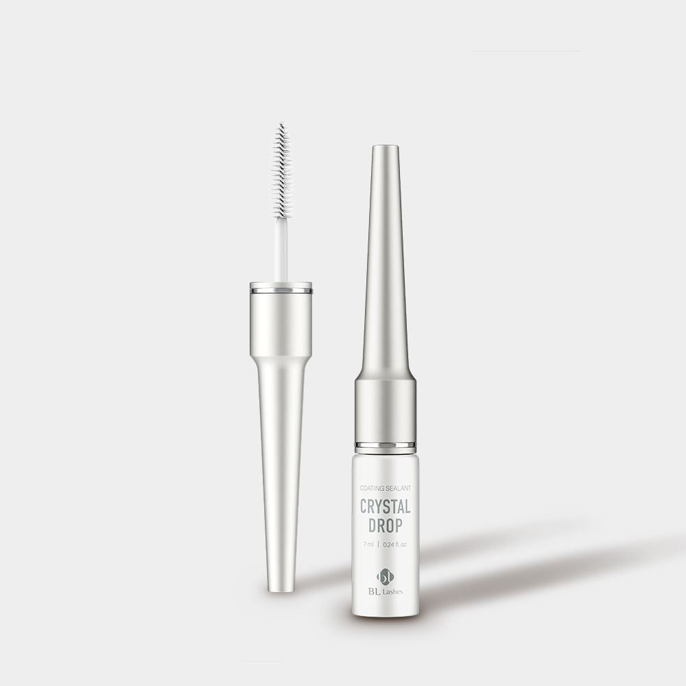 Front view of BL Lashes Crystal Drop Coating Sealant bottle next to its opened mascara wand applicator.