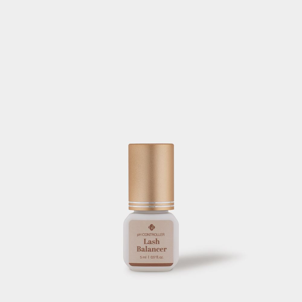 BL Lashes Lash Balancer pH Controller in a small frosted glass bottle with a metallic gold cap, displayed on a light gray background. The beige label reads ?œpH Controller Lash Balancer??with the volume ?? ml / 0.17 fl. oz.??A soft shadow falls to the right, emphasizing a clean, minimal studio-style presentation that highlights the compact professional product designed for pH balancing during eyelash extension preparation and lash treatment procedures.
