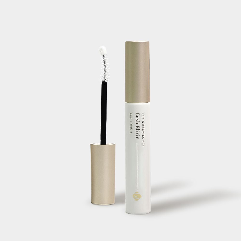 Front view of BL Lashes Lash Elixir tube next to its opened wand applicator.